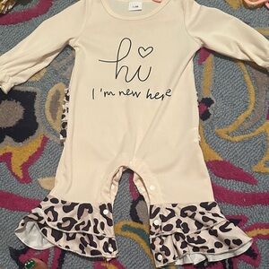 Cream Baby Romper with Leopard Ruffle Details
